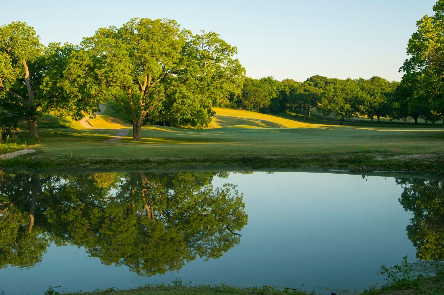 Woodhaven CC course view with green and trees