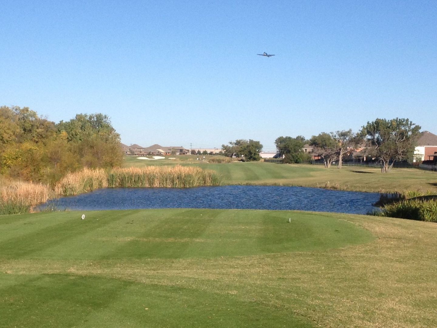 Tee box view down the fairway with bunkers