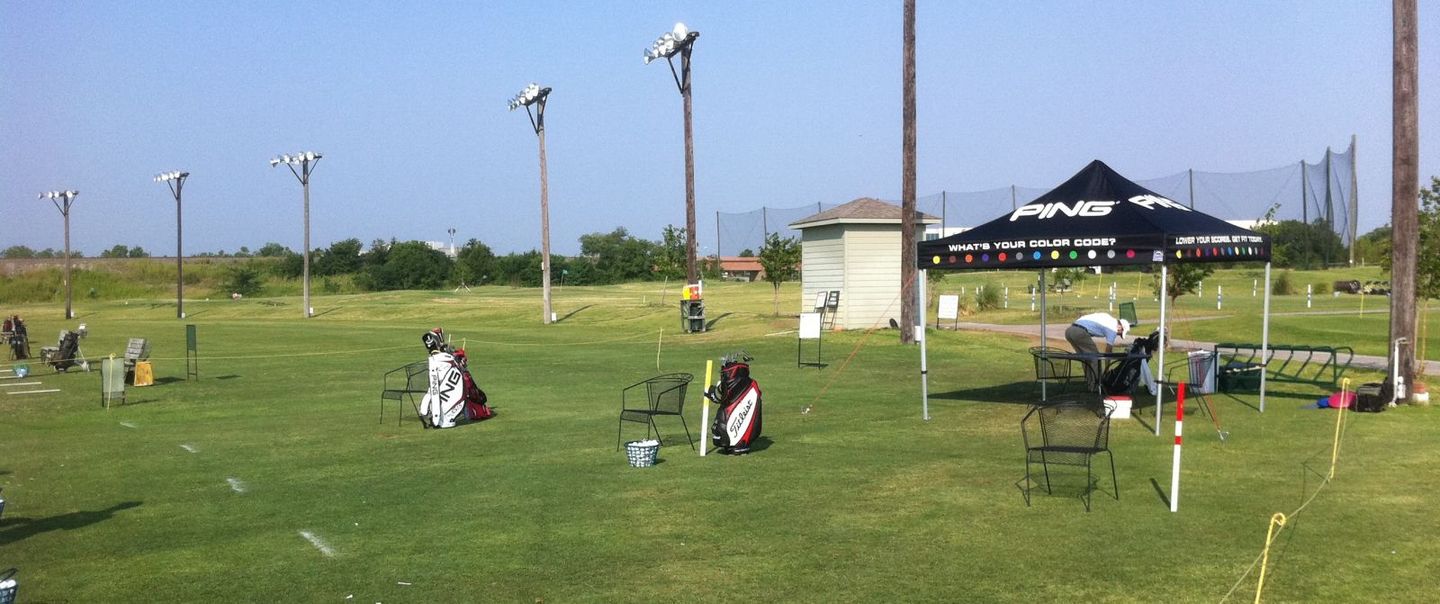 Sunny day view of the par-3 course greens